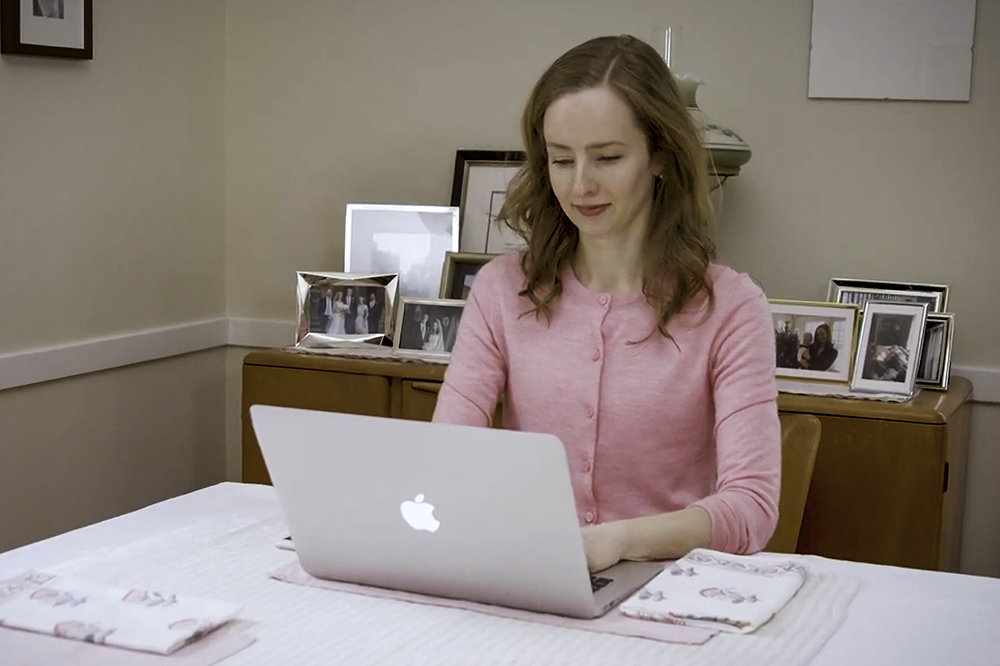 Jane Ginther studies at home on her laptop.