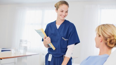Nursing talking with patient