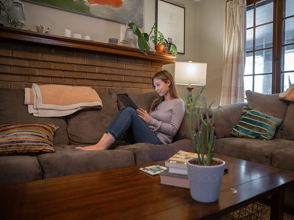 A student researches new semester tips on a tablet.