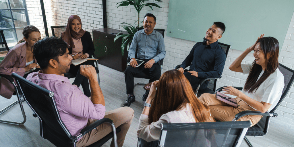 A group has a discussion sitting in a circle
