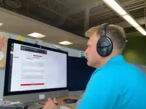 A student completes an activity on CarmenCanvas.