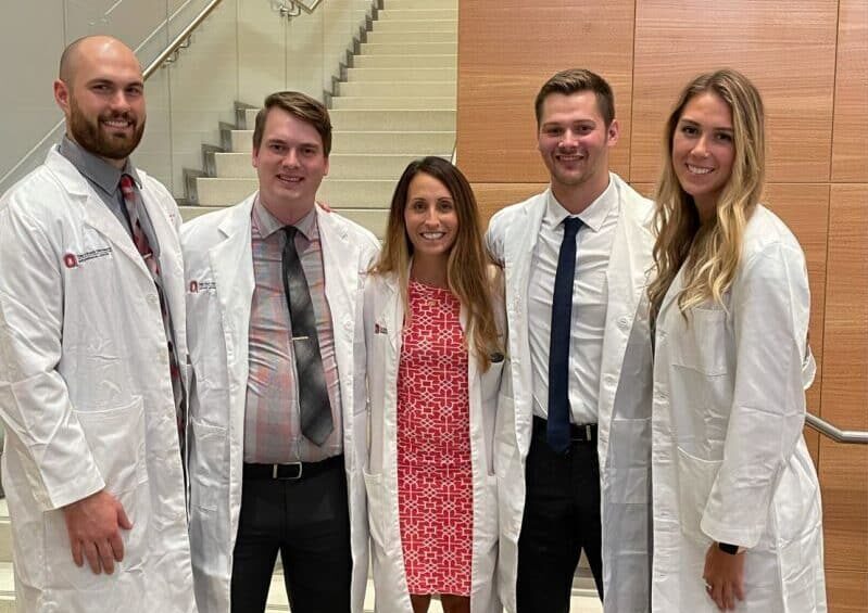 MS HSPAL alum and program director Lisa Mostafavifar takes a photo with pharmacy residents.