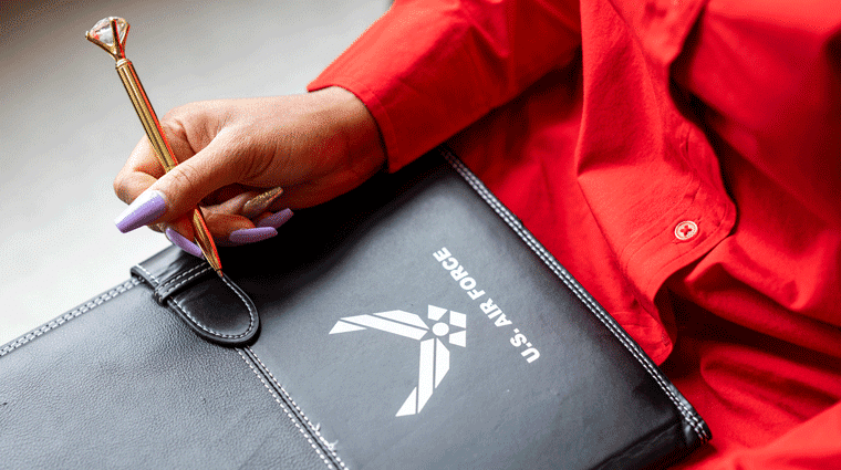 Close up image of Air's padfolio with the U.S. Air Force logo on it