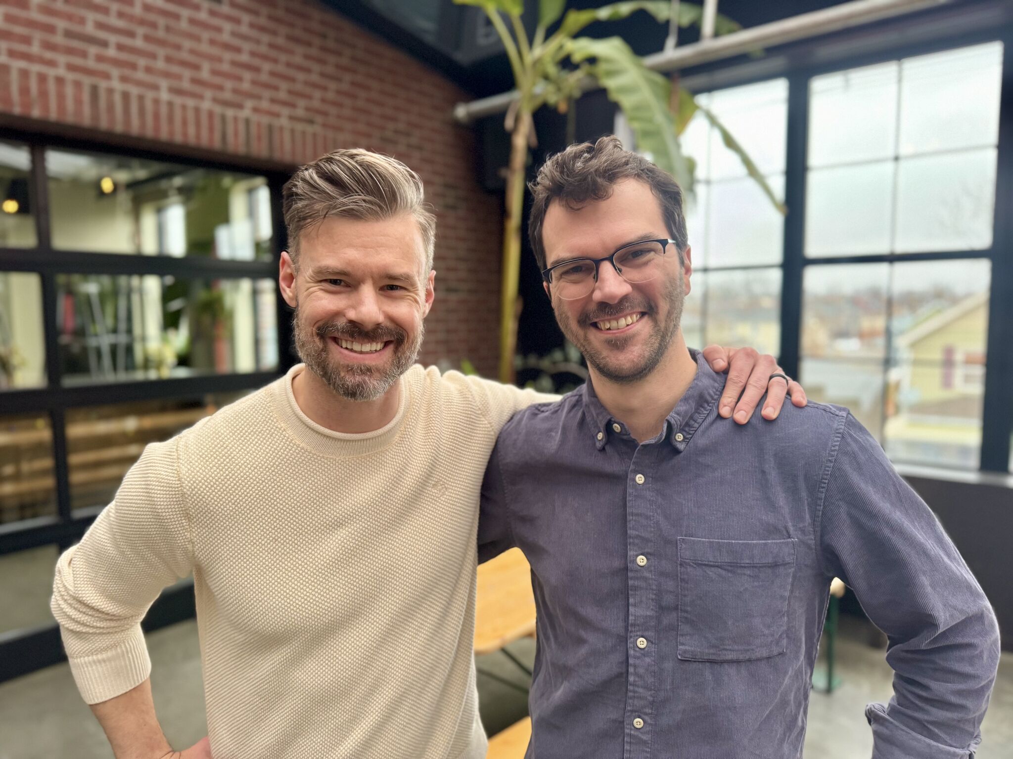 Jason Hazel (left) smiles with Jason Johns (right)