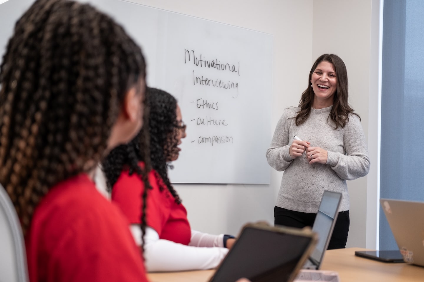 An OSU Doctor of Nursing Education graduate teaches a classroom of nursing students