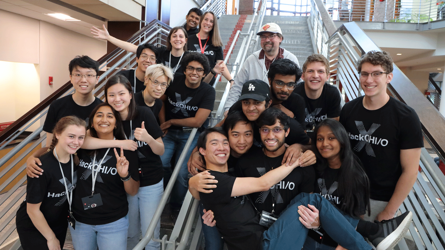 Group photo of Ohio State students wearing Hack OH/IO shirts