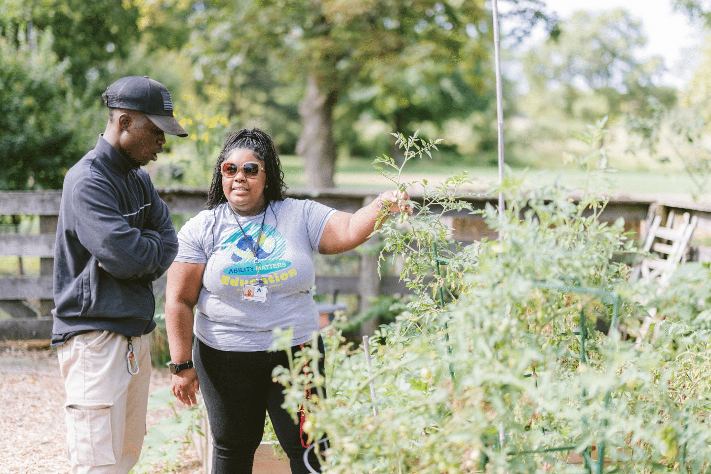 ABA student working with a client in a community garden as part of a BCBA fieldwork placement